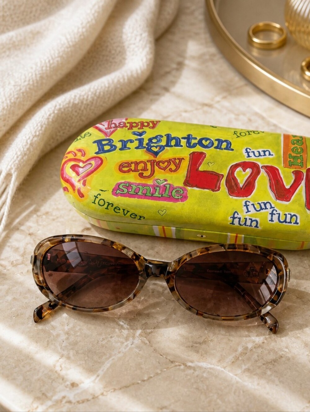 Brighton Tortoiseshell Oval Sunglasses with Brown Lenses and Colorful Case